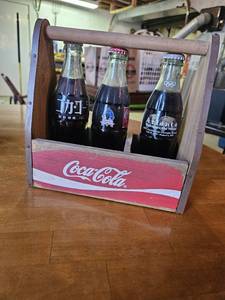 lot 7727 image: Vintage Coca Cola Bottles in Wood Carrier