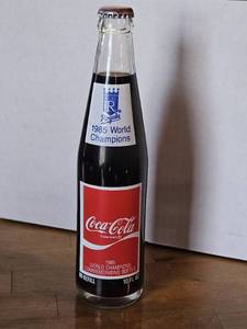 lot 7732 image: 1985 Kansas City Royals World Series Champions Coca-Cola Commemorative Bottle