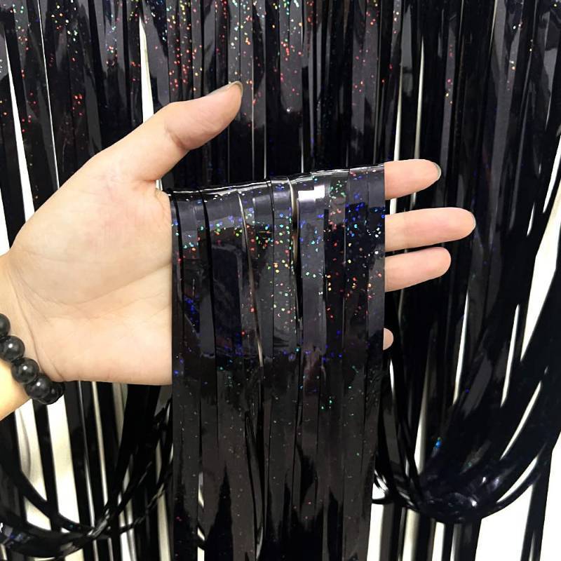 lot 1246 image: 3 Pack Fringe Curtains Party Decorations,Tinsel Backdrop Curtains for Parties,Photo Booth Wedding Graduations Birthday Christmas Event Party Supplies (Black) Retail $11.50