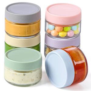 lot 1280 image: AOZITA Glass Salad Dressing Containers To Go, 4Pack Condiment Cups with Lids, 2 oz Leakproof Reusable Sauce Cups for Lunch Box, Picnic and Travel Retail $14.88