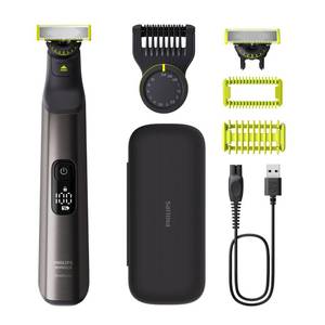 lot 2224 image: Philips Norelco OneBlade 360 Pro Face  Body Electric Beard Trimmer, Shaver and Bodygroomer, with 360 Blade Technology, 2X 360 Blade, 20-Length Adjustable Comb, Body Kit, and Travel Case, QP655290 - Retail $91.39