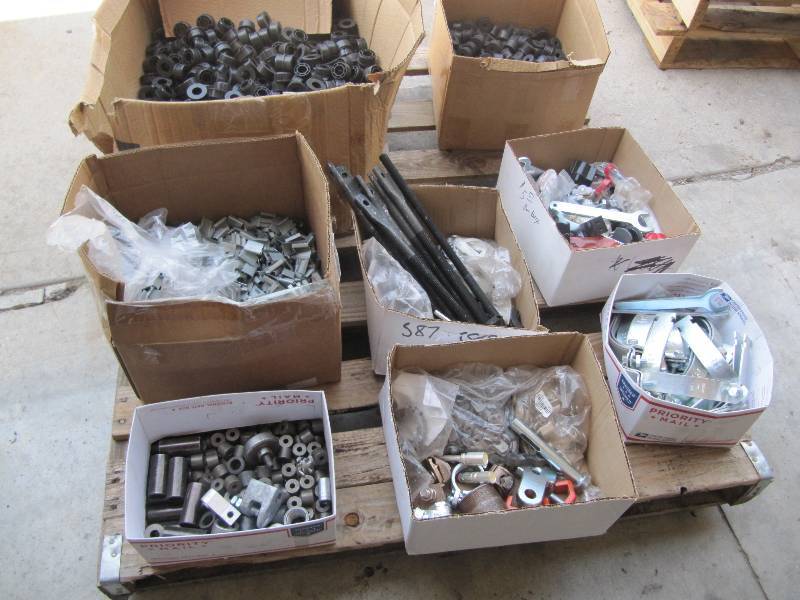 lot 338 image: Pallet Full Of Bolts Nuts , Exhaust Bushing, Hangers Misc Bolts and Nuts and Industrial