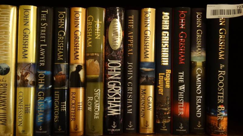 lot 722 image: 19 hard back John Grisham books