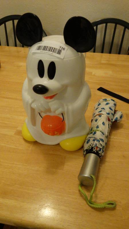 lot 726 image: Mickey Mouse Halloween candy bucket & umbrella
