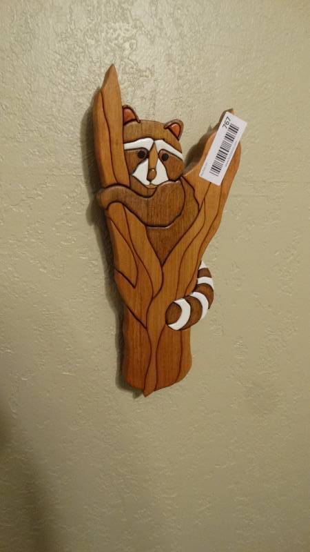 lot 767 image: Wood carved ring tail Lemur wall art