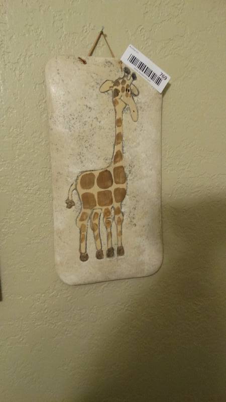 lot 769 image: Giraffe wall art