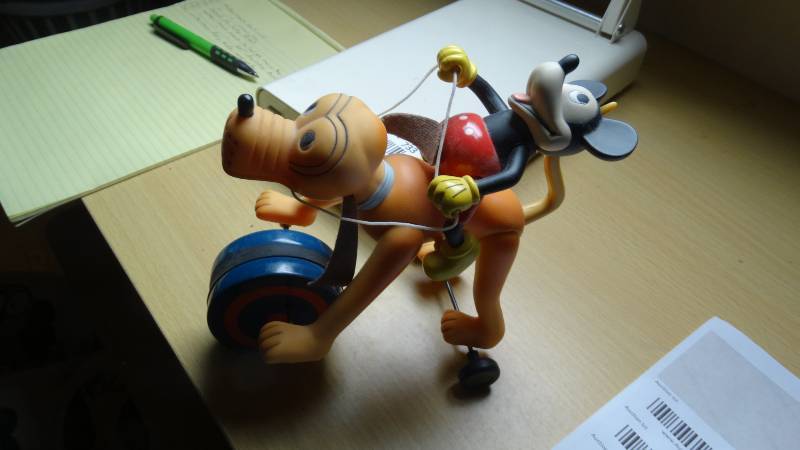 lot 796 image: Mickey Mouse riding Goofy wind up toy