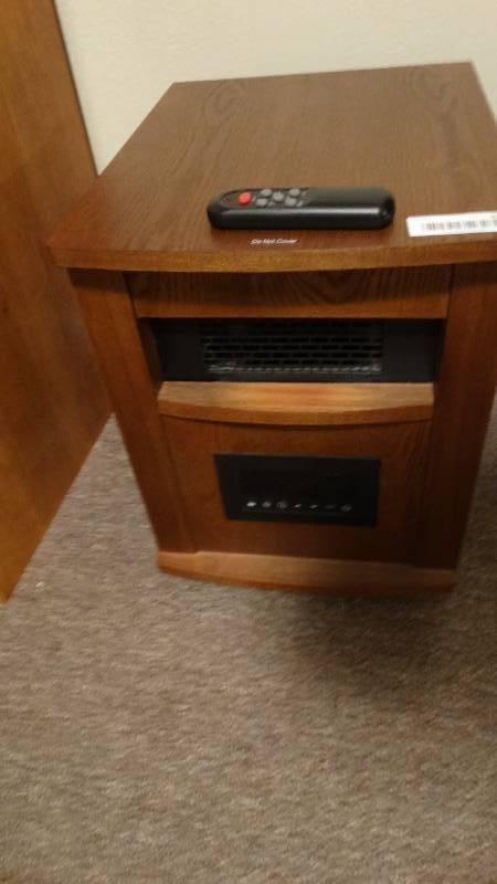 lot 928 image: Infrared heater w remote