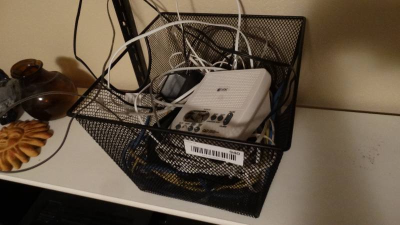 lot 940 image: Metal trash can w cords cables