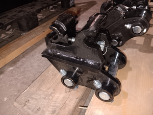 lot 1353 image: Unused Mechanical Quick Hitch Attachment for Mini Excavator - Can Quickly Connect Different Attachments (Such as Rake Digging Bucket Scarifier etc). Expand the Scope of Excavator Use, Save Time and Improve Work Efficiency.