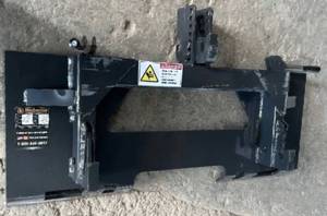 lot 1286 image: Unused Wolverine 3 Point Quick 1 Tach PT-16-01CAdapt Universal Skid Steer Quick Tach to Category 1 & 2, 3 Point Quick Hitch. Reinforced with 3.25x3.25in Tubular Steel Lightweight Design Saving On Your Loaders Lifting Capacity