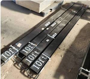 lot 1329 image: One (1) Set of Unused GIYI Industrial Grade 10ft Forklift Fork Extensions