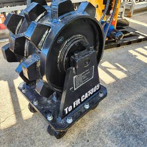 lot 1308 image: UNUSED - GIYI - Heavy Duty 406lb Compaction Wheel Attachment for a CAT 305 Excavator or Equivalent - 16 Inch Diameter - 11 Inches Wide