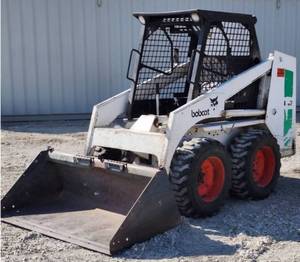 lot 1252 image: Bobcat 642 Skid Steer  Ford Gasoline Engine  New Tires  Service Book  1700 Hours - New Foam Filled Tires - New Upgraded Operators Seat Still in Plastic - All New Filters - New Gas Line, Rear Main Seal & Battery