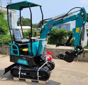 lot 1299 image: Unused AGT QH12R Teal 15hp gas engine, Engine Type 4 Stroke OHV, 420cc, Net Power 3600rpm, Net Torque 2500rpm, 7 rubber tracks, 16 tooth bucket, adjustable thumb, 36 blade, 3rd auxiliary hydraulic valve, work lights
