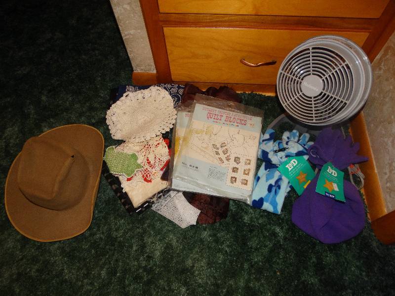 lot 2024 image: Quilt Blocks, Doilies, Bandanas, Old Cowboy Hat, New Hat & Glove Sets, Small Room Fan.