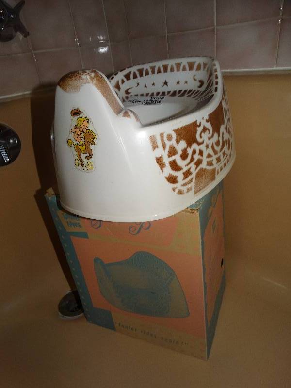 lot 2028 image: Vintage Tommee Tippee - Junior Rides Again Saddle Potty. In Great shape - wOriginal Box.