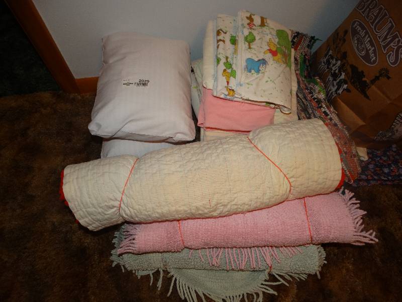 lot 2029 image: Lot of Pillows, Linens, Blanket, & 4 Rugs.