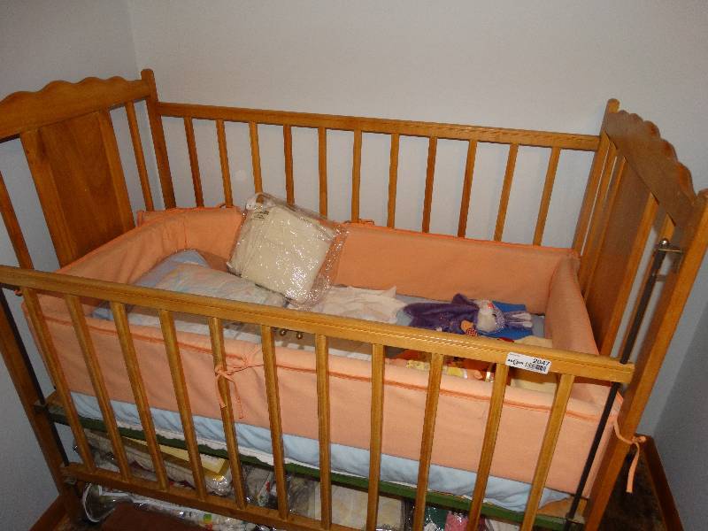 lot 2047 image: Vintage Wood Baby Bed wMattress, Bedding, Pads, Dolls.