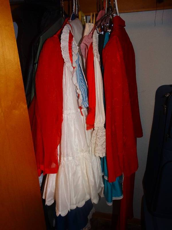 lot 2053 image: Lot of Ladies Clothing, Square Dance Outfits, Clothing Bags, Closet Shoe Organizer, and All Hangers.