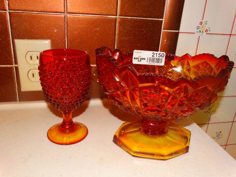 lot 2150 image: Amberina Pressed Glass Pedestal Compote & Hobnail Stemmed Glass.