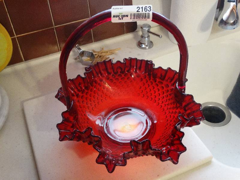 lot 2163 image: Large Fenton Ruby RedAmberina Handled Hobnail Glass 12 Basket. Handle has CrackChip.