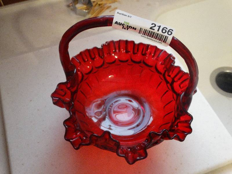 lot 2166 image: Ruby Red Pressed Glass Basket.  8 Tall x 8 12 Wide.  Possibly Fenton.