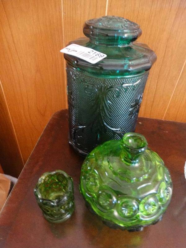 lot 2169 image: Moon & Stars pattern Green Glass Lidded Candy Dish & Toothpick Holder. Tiara Glass Lidded Canister.