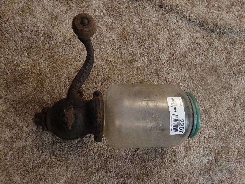 lot 2207 image: Antique 1917 Parker #449 Wall Mount Coffee Grinder wOriginal jar.  Missing one foot.