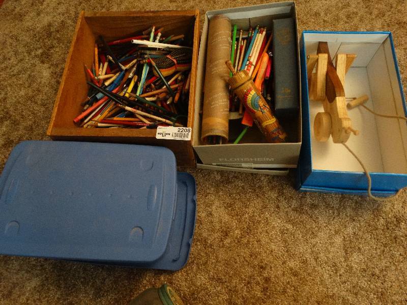 lot 2208 image: Lot of Pens, Pencils in box, Small Shoe Tubs, Wood Grasshopper Pull Toy.