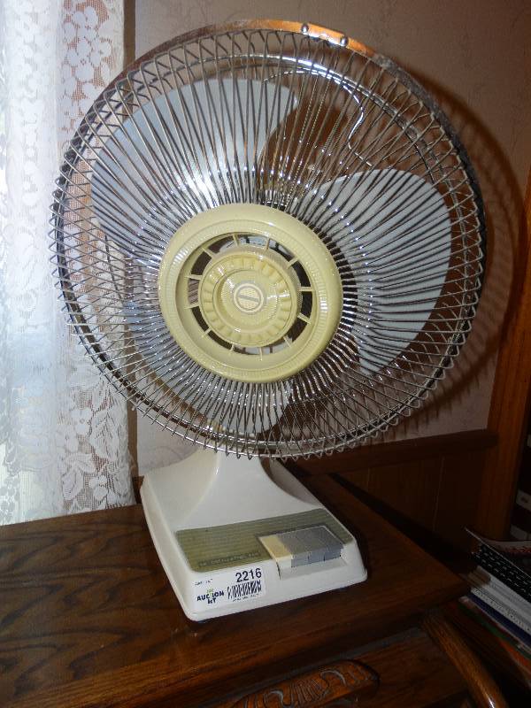 lot 2216 image: 12 Oscillating Fan.
