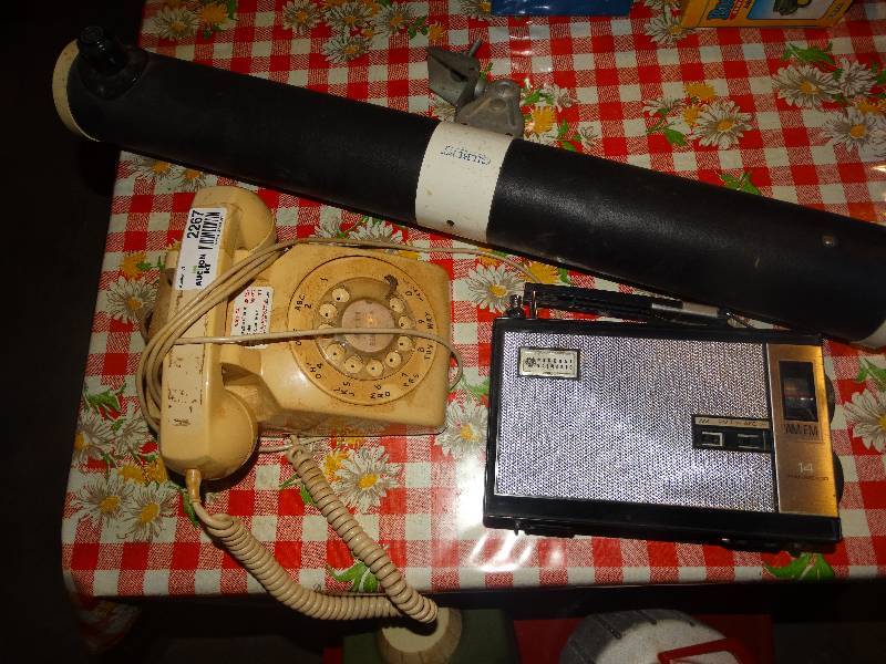 lot 2267 image: Vintage Rotary Phone, GE Transistor Radio, & Telescope.