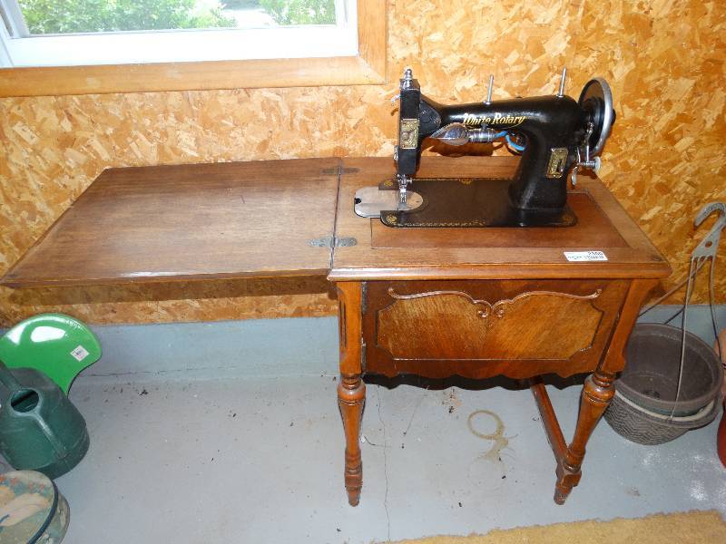 lot 2300 image: Antique White Rotary Sewing Machine in Wood Cabinet wSewing Supplies.