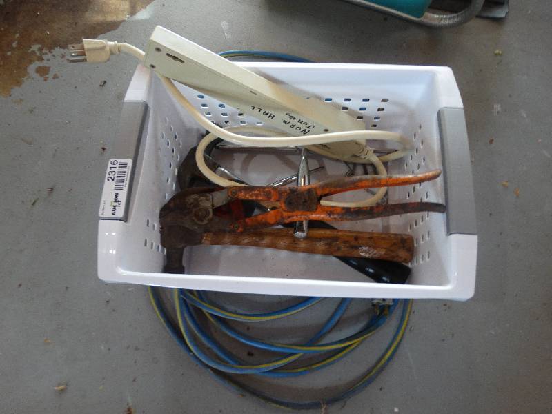 lot 2316 image: Storage Tub, Hammers, Squeegie, Clipper, Screwdriver, Power Strip, & Ext. cord.