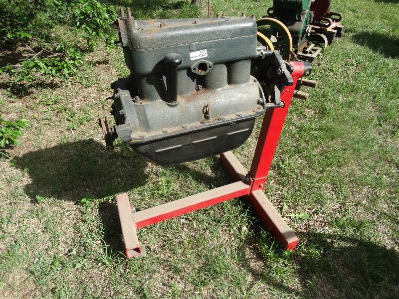 lot 2376 image: Model A motor w motor stand
