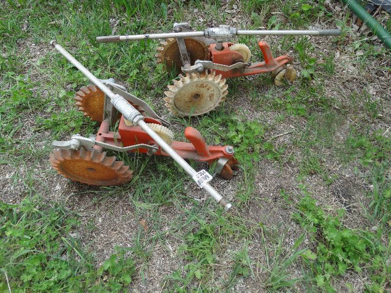 lot 2384 image: 2 old metal tractor sprinklers