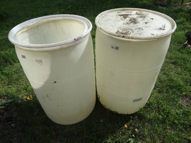 lot 2387 image: 2 plastic 55 gallon barrels