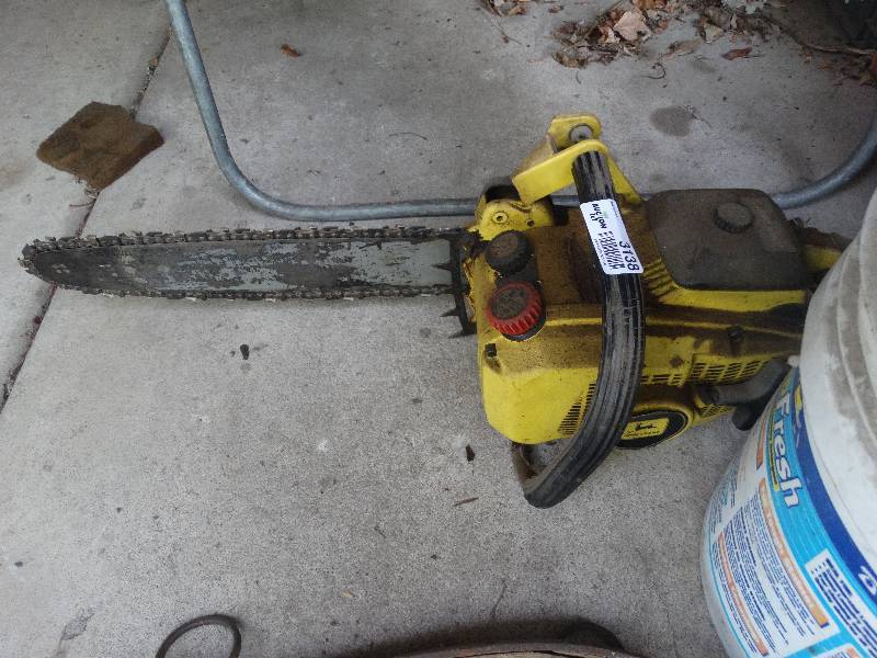 lot 3138 image: John Deere chainsaw.