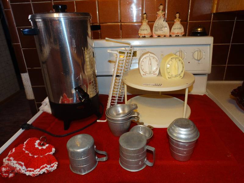 lot 2133 image: Percolator & all kitchenwaredecor on stove top.