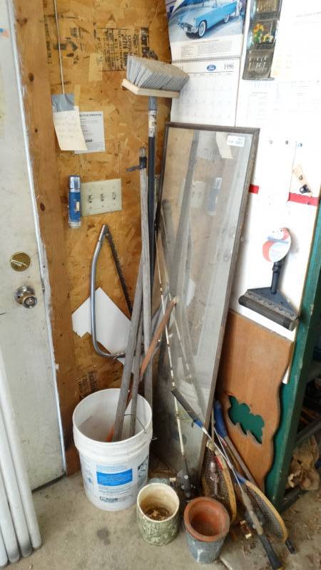 lot 3005 image: Mirror, long handles, fishing poles, flower pots, bucket and a saw.