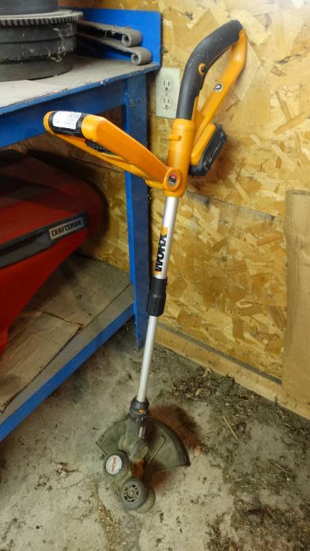 lot 3018 image: Worx weed eater with charger. works.