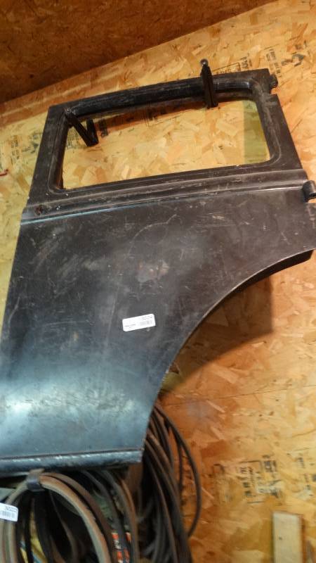lot 3024 image: Old metal car door.