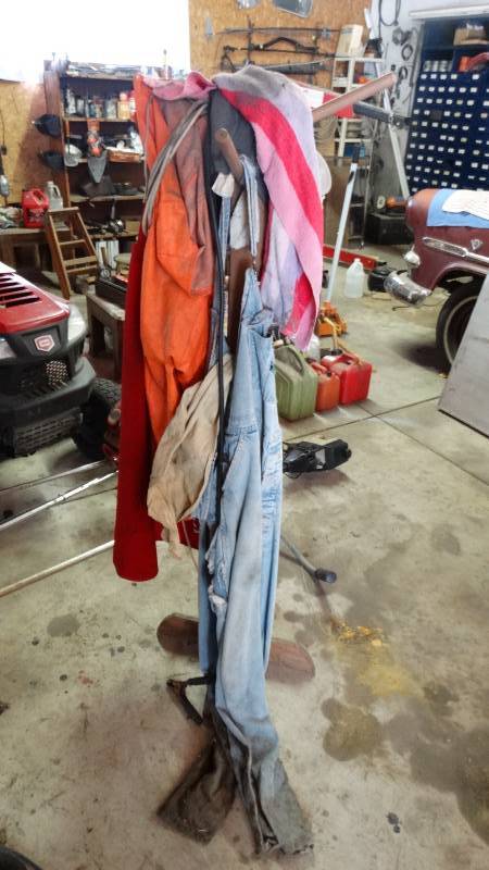 lot 3033 image: Coat rack with contents.