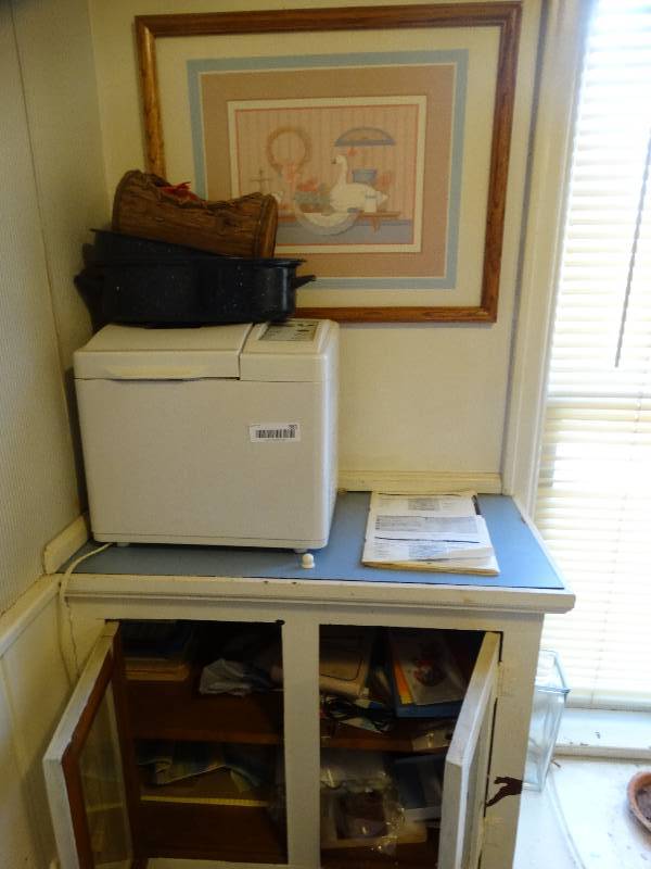 lot 581 image: Contents of cabinet- WestBend break maker framed print misc.