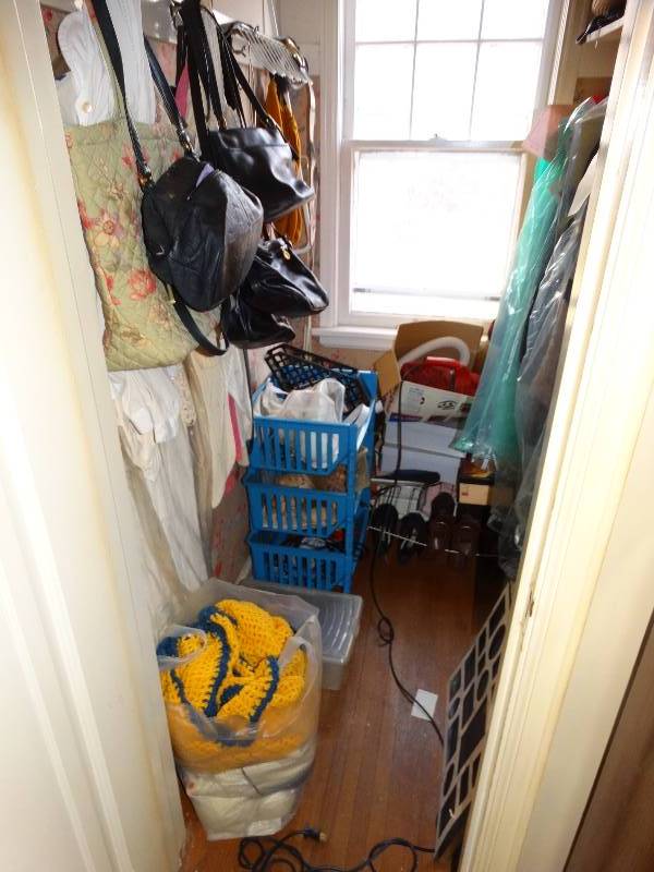 lot 632 image: Contents of walk in closet- clothes bags blankets misc.
