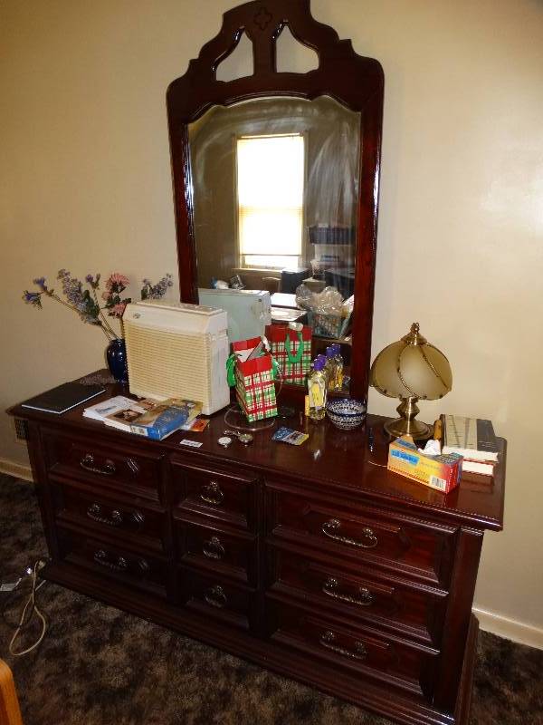 lot 647 image: 9 drawer dresser w mirror & various decor items on top