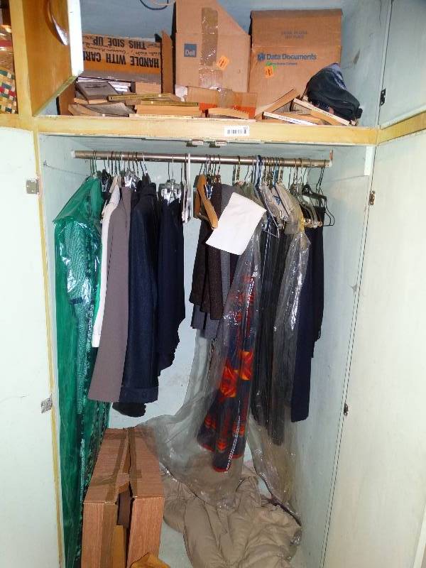 lot 653 image: Clothes & other contents of cabinet