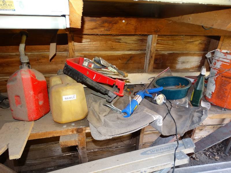 lot 695 image: Gas cans paint supplies & misc on shelf