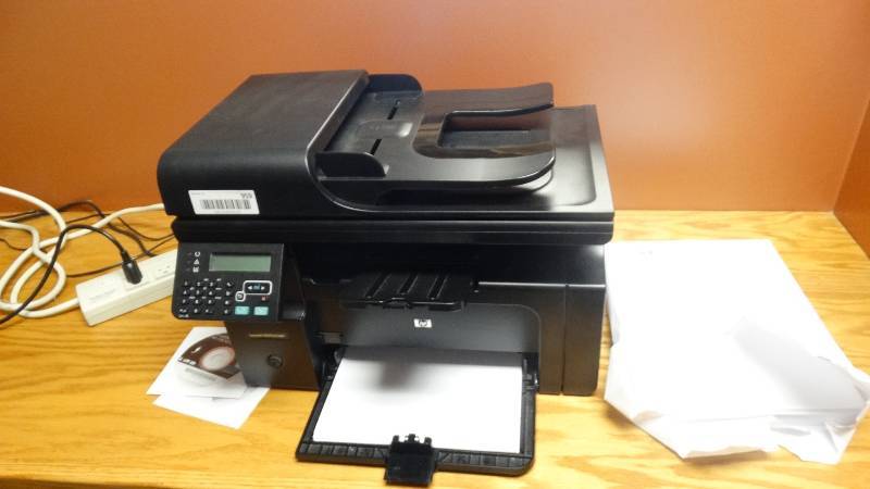 lot 959 image: HP LaserJet M1212NF MFP printer w cords & power strip