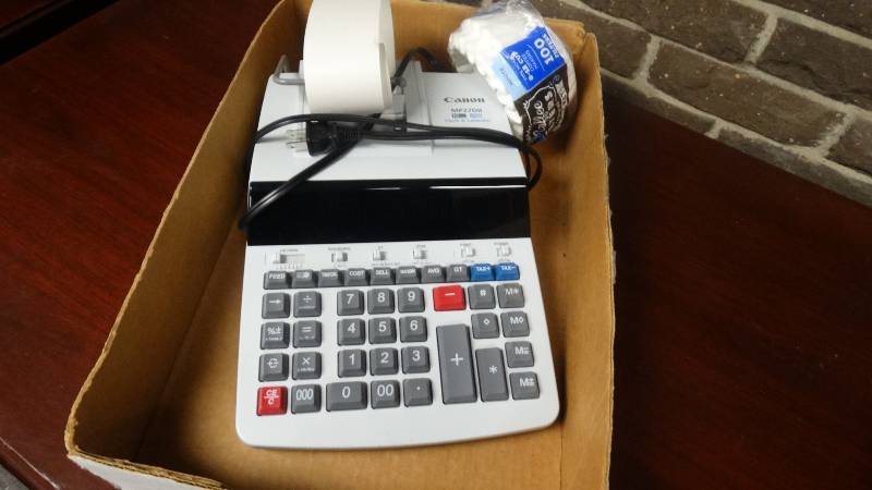 lot 1066 image: Canon calculator & coffee filters